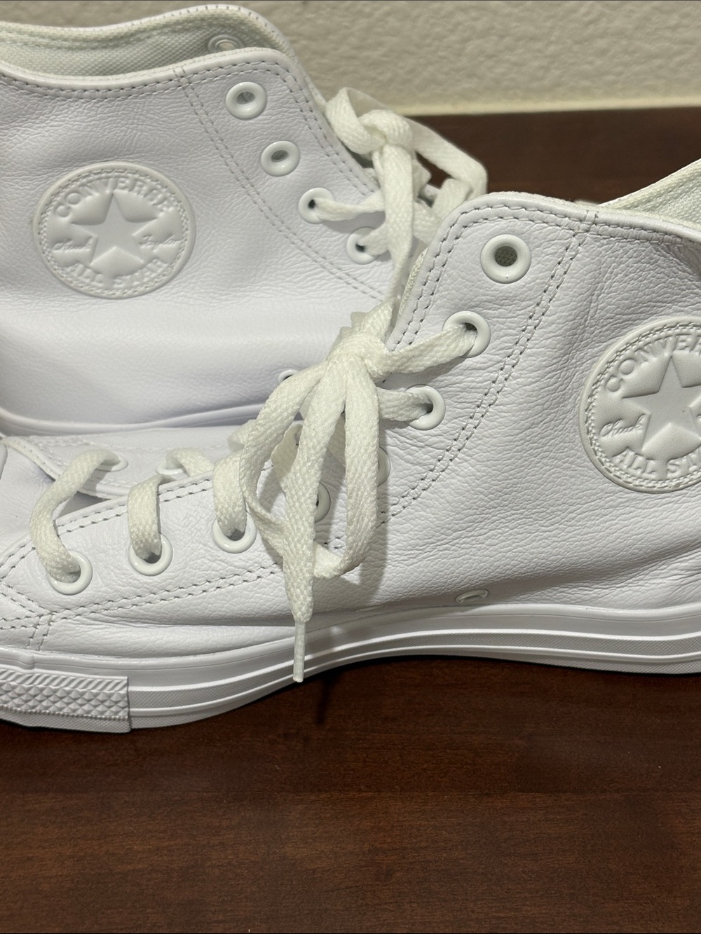 Converse White High-Top Sneakers
Chuck Taylor all leather - Picture 3 of 5